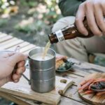 Rugged Barrel Shaped Stainless Steel Mug in Adventure and Outdoor Expedition Setting