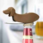Using Dog Shaped Bottle Opener to Open Beer Bottle at Casual Bar or Party