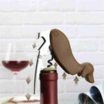 Using Dog Shaped Bottle Opener to Open Red Wine Bottle in Elegant Bar Setting