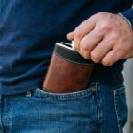 Leather Wrapped Hip Flask Carried Discreetly in Suit Pocket for Formal Events and Gifting