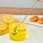 Precision Cocktail Preparation with Pestle Tip Twisted Stem Stainless Steel Spoon in Luxury Lounge