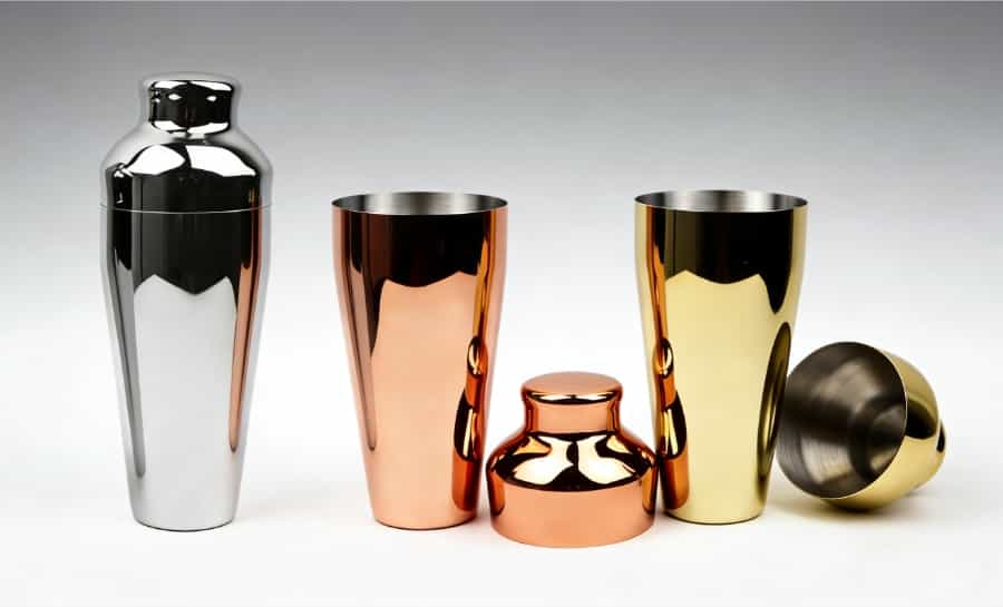 french parisian cocktail shaker in upscale bar setting elegant barware