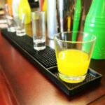 Commercial Bar Setup Using Single End Long Rubber Bar Mat During Busy Service
