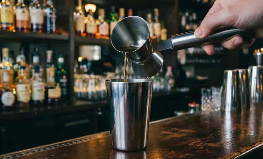 handled jigger grip and pour technique bartender stainless steel long handle cocktail measuring