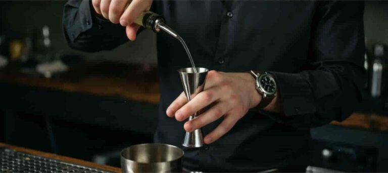 how to use a cocktail jigger step by step bartender measuring spirits stainless steel